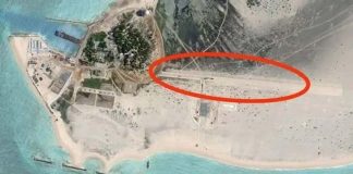 衛星資料顯示，位在西沙群島的中建島上，已出現一條長約600多公尺的機場跑道，及一個巨大新工作區，其中包括一座水泥廠。圖／第一軍情