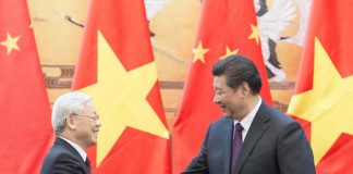 圖為2015年越共中央總書記阮富仲訪問北京，與習近平舉行會談。圖／取自新華社