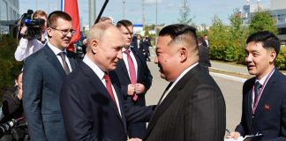 北韓領導人金正恩與俄羅斯總統普丁在東方太空發射場會面。圖／取自新華社