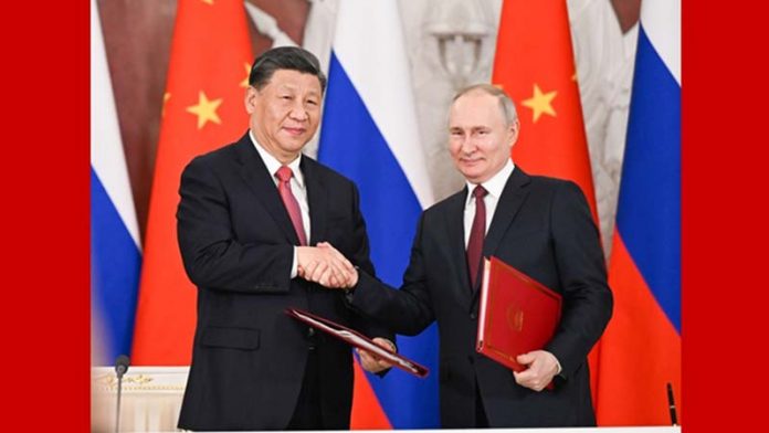 今年3月時習近平訪問俄羅斯，目前傳出10月時普丁將訪問北京。圖／新華社資料照